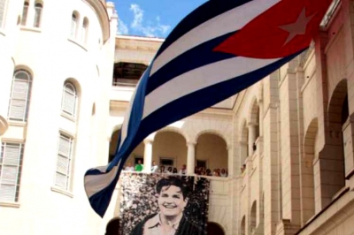 Imagen de Palacio Presidencial, bandera cubana y José Antonio Echeverría